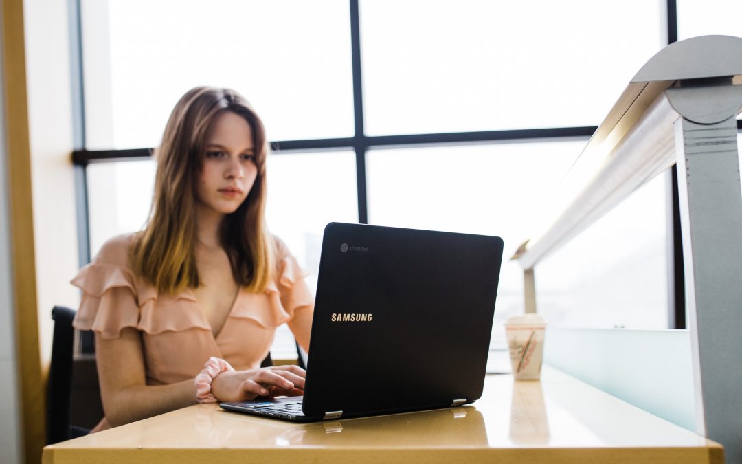 Female teen at laptop